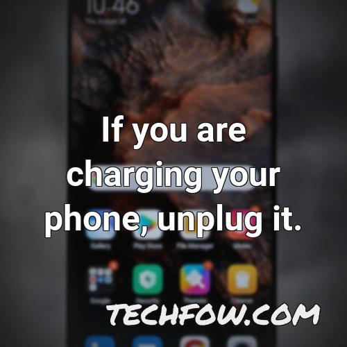 if you are charging your phone unplug it
