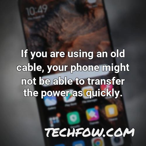 if you are using an old cable your phone might not be able to transfer the power as quickly