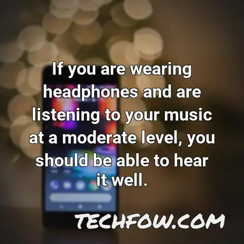 if you are wearing headphones and are listening to your music at a moderate level you should be able to hear it well