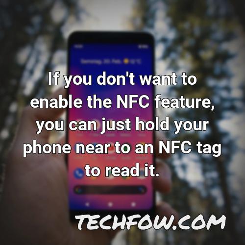if you don t want to enable the nfc feature you can just hold your phone near to an nfc tag to read it