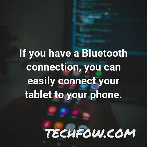 if you have a bluetooth connection you can easily connect your tablet to your phone