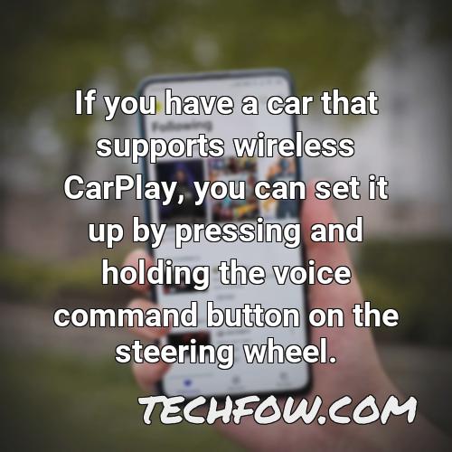if you have a car that supports wireless carplay you can set it up by pressing and holding the voice command button on the steering wheel