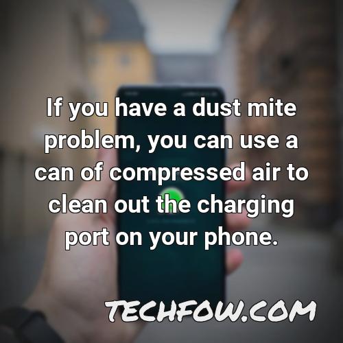 if you have a dust mite problem you can use a can of compressed air to clean out the charging port on your phone