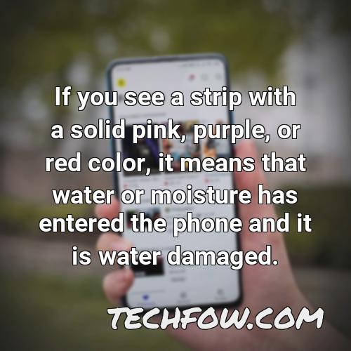 if you see a strip with a solid pink purple or red color it means that water or moisture has entered the phone and it is water damaged