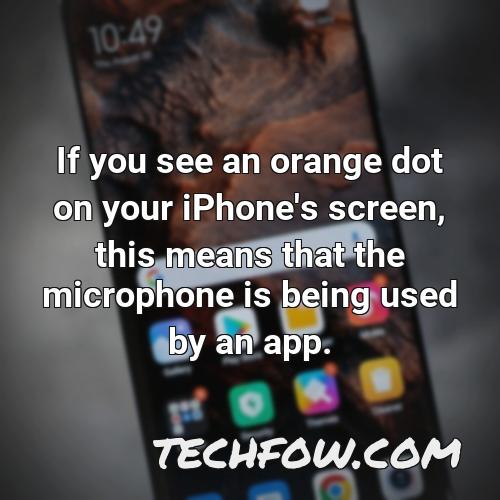 if you see an orange dot on your iphone s screen this means that the microphone is being used by an app