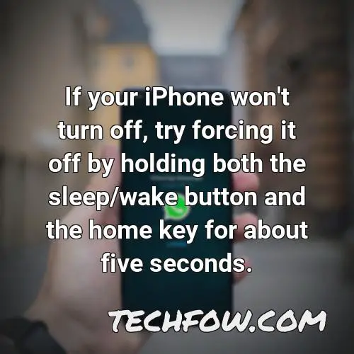 if your iphone won t turn off try forcing it off by holding both the sleep wake button and the home key for about five seconds