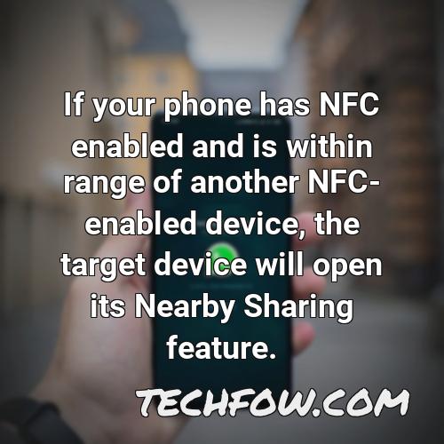 if your phone has nfc enabled and is within range of another nfc enabled device the target device will open its nearby sharing feature