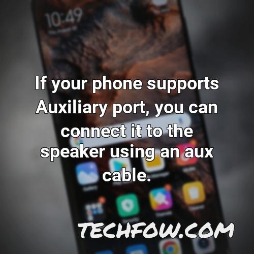 if your phone supports auxiliary port you can connect it to the speaker using an aux cable