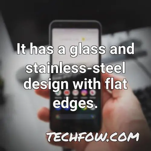 it has a glass and stainless steel design with flat edges