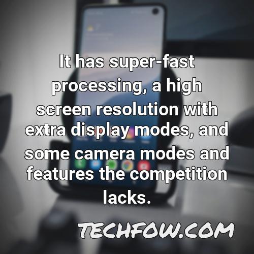 it has super fast processing a high screen resolution with extra display modes and some camera modes and features the competition lacks