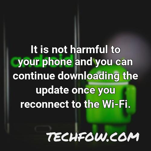 it is not harmful to your phone and you can continue downloading the update once you reconnect to the wi fi