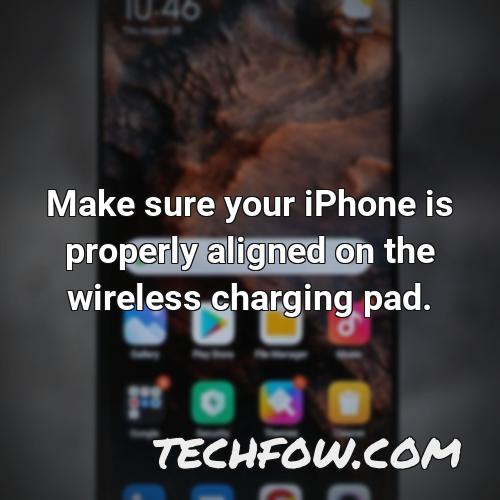 make sure your iphone is properly aligned on the wireless charging pad
