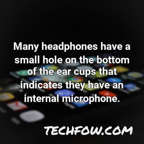 many headphones have a small hole on the bottom of the ear cups that indicates they have an internal microphone