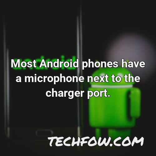 most android phones have a microphone next to the charger port