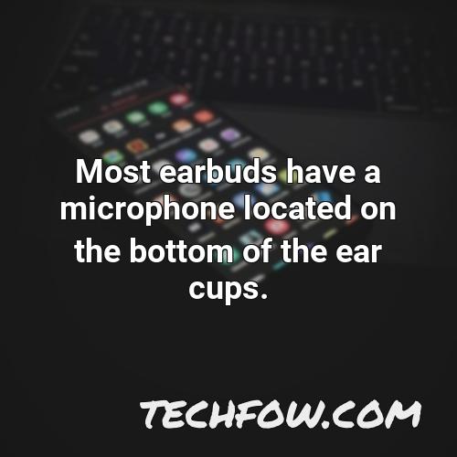 most earbuds have a microphone located on the bottom of the ear cups