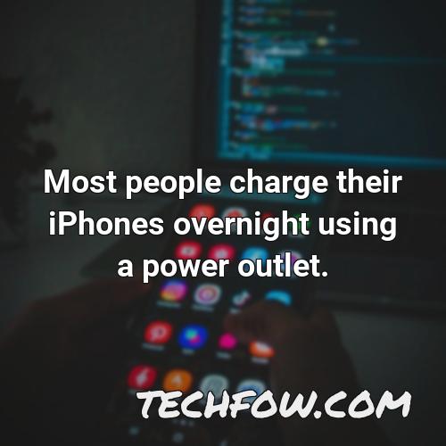 most people charge their iphones overnight using a power outlet
