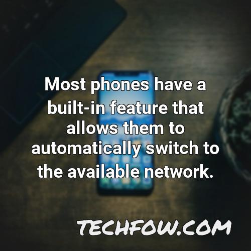 most phones have a built in feature that allows them to automatically switch to the available network