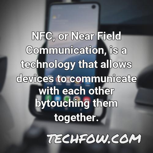 nfc or near field communication is a technology that allows devices to communicate with each other bytouching them together