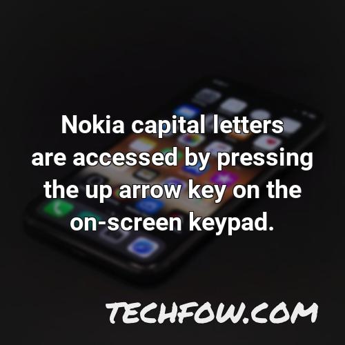 nokia capital letters are accessed by pressing the up arrow key on the on screen keypad