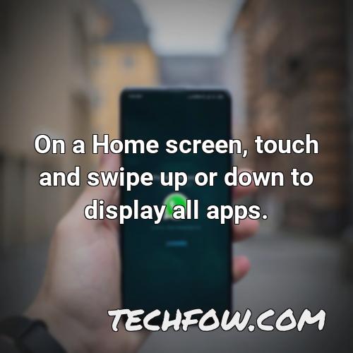 on a home screen touch and swipe up or down to display all apps