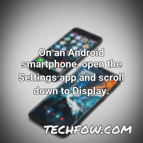 on an android smartphone open the settings app and scroll down to display
