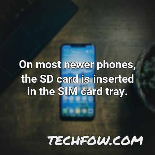 on most newer phones the sd card is inserted in the sim card tray