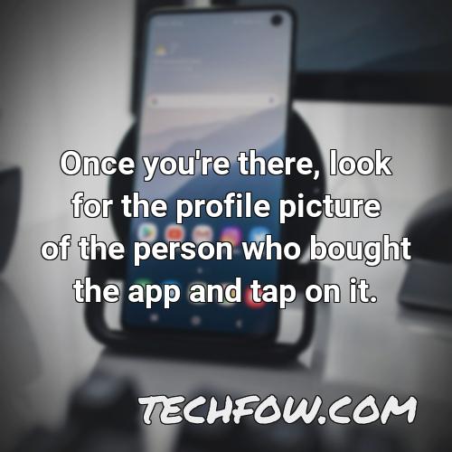 once you re there look for the profile picture of the person who bought the app and tap on it