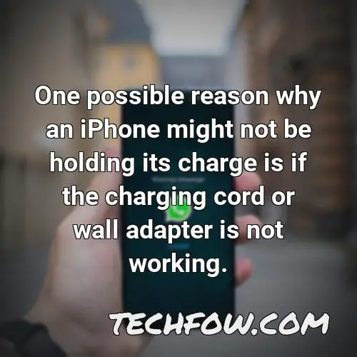 one possible reason why an iphone might not be holding its charge is if the charging cord or wall adapter is not working