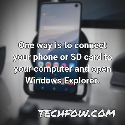 one way is to connect your phone or sd card to your computer and open windows