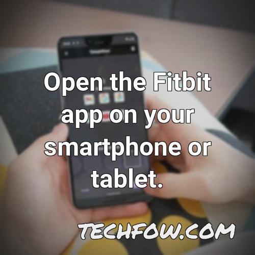 open the fitbit app on your smartphone or tablet