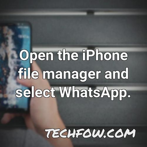 open the iphone file manager and select whatsapp