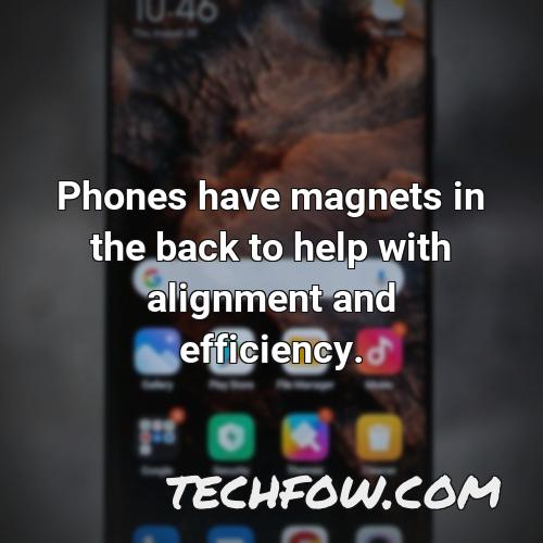 phones have magnets in the back to help with alignment and efficiency