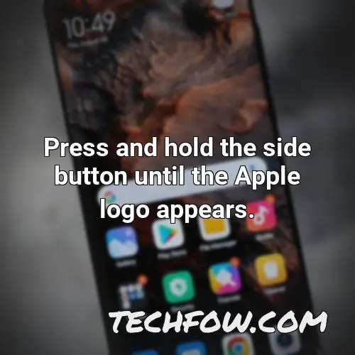 press and hold the side button until the apple logo appears