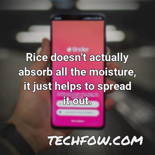 rice doesn t actually absorb all the moisture it just helps to spread it out