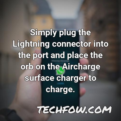 simply plug the lightning connector into the port and place the orb on the aircharge surface charger to charge