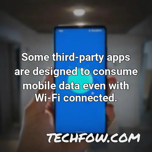 some third party apps are designed to consume mobile data even with wi fi connected