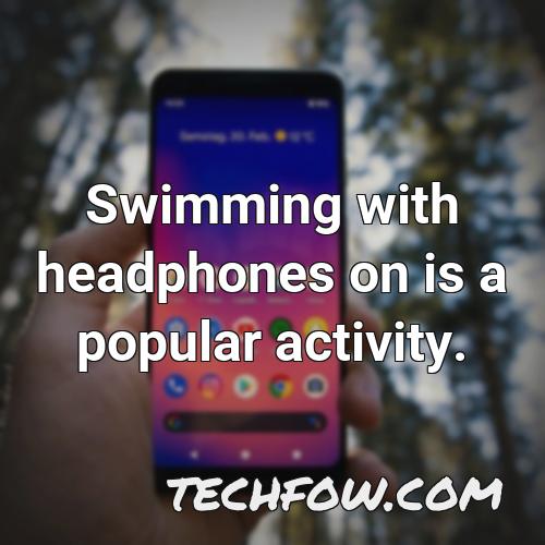 swimming with headphones on is a popular activity