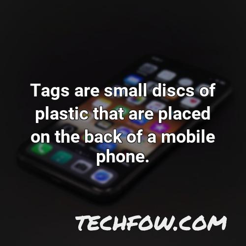 tags are small discs of plastic that are placed on the back of a mobile phone