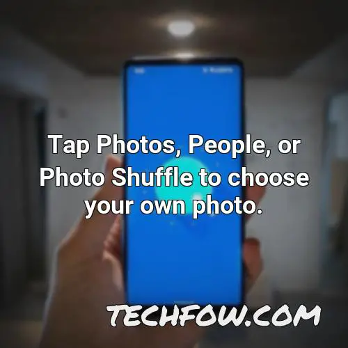 tap photos people or photo shuffle to choose your own photo
