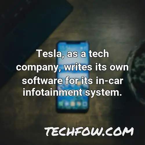 tesla as a tech company writes its own software for its in car infotainment system