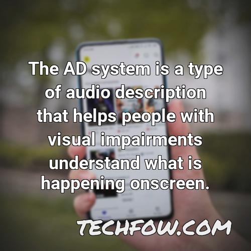 the ad system is a type of audio description that helps people with visual impairments understand what is happening onscreen