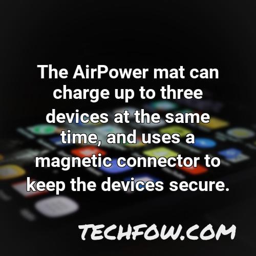 the airpower mat can charge up to three devices at the same time and uses a magnetic connector to keep the devices secure