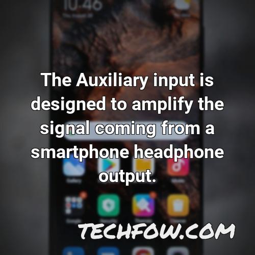 the auxiliary input is designed to amplify the signal coming from a smartphone headphone output