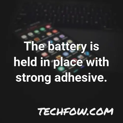 the battery is held in place with strong adhesive