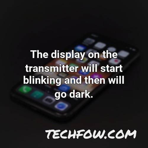 the display on the transmitter will start blinking and then will go dark