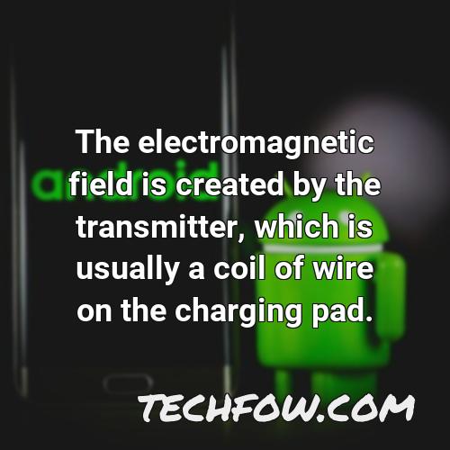 the electromagnetic field is created by the transmitter which is usually a coil of wire on the charging pad