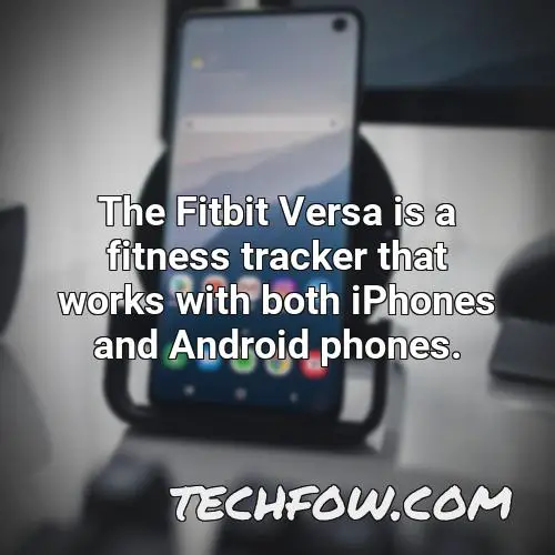 the fitbit versa is a fitness tracker that works with both iphones and android phones
