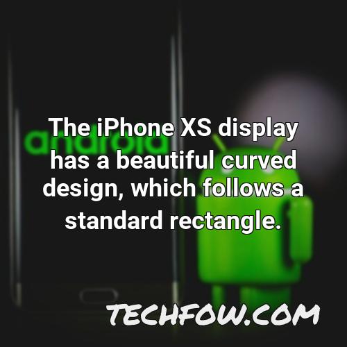 the iphone xs display has a beautiful curved design which follows a standard rectangle