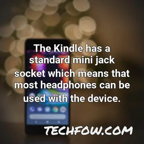 the kindle has a standard mini jack socket which means that most headphones can be used with the device