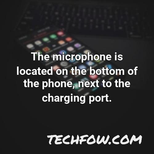 the microphone is located on the bottom of the phone next to the charging port
